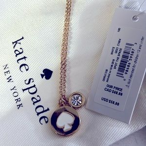 Kate Spade necklace. NWT & Jewelry bag. Very cute !